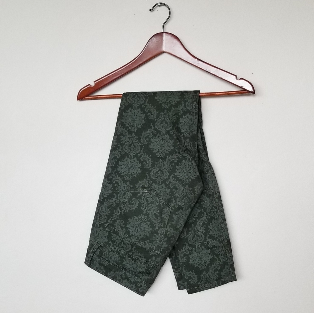 Green damask print skinny jeans